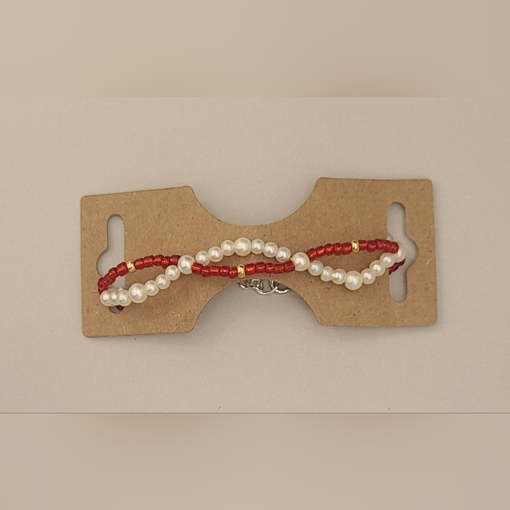 Red & pearl gold swirl bracelet with gold accents